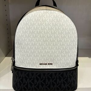 (SOLD) FACTORY SEALED Michael Kors Black Optic White Multi Medium Rhea Backpack